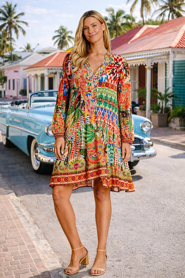 Boho print flowing mini dress in a short, above-the-knee cut