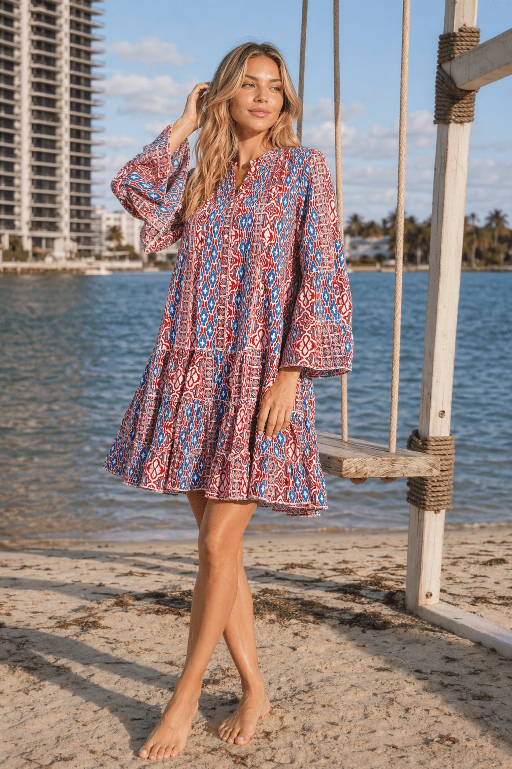 Red & Blue tribal block print bell-sleeve tiered boho mini dress — full styling shot | Beach-to-dinner resort dress