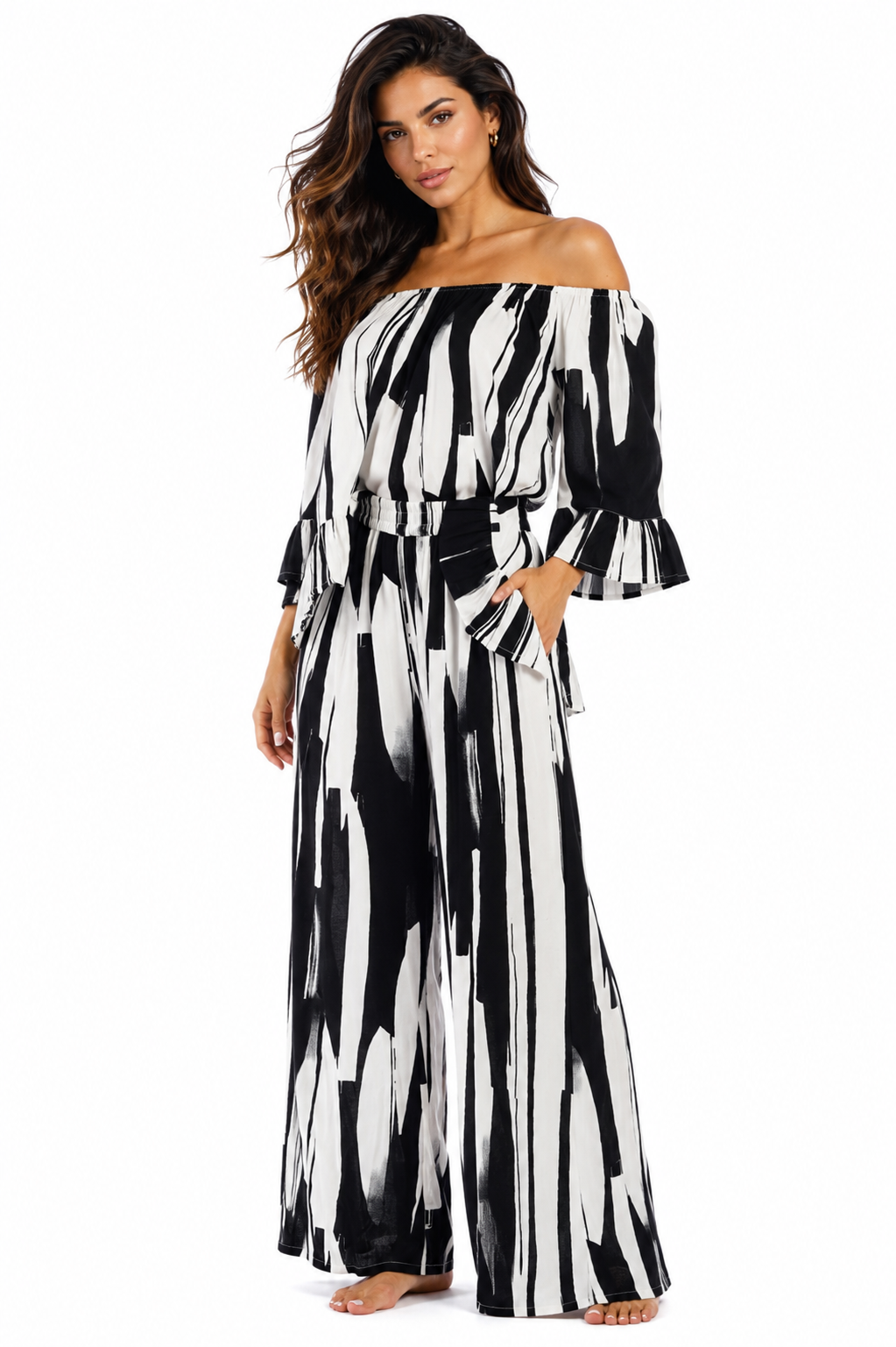 Black and white abstract brushstroke off-shoulder crop top and wide-leg pants two-piece resort set by Club Moda — front view