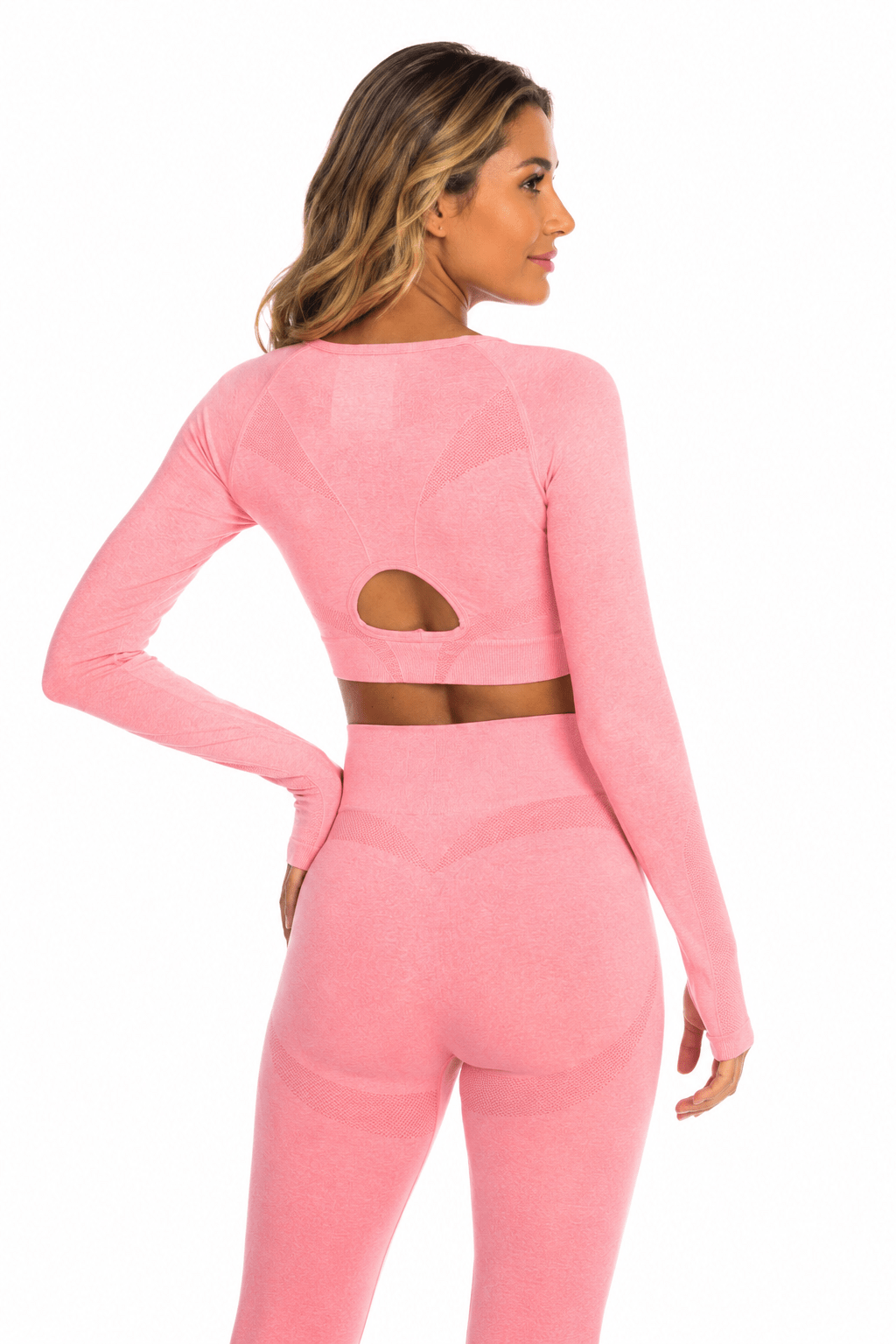 Blush pink seamless long-sleeve open-back crop top, further product view