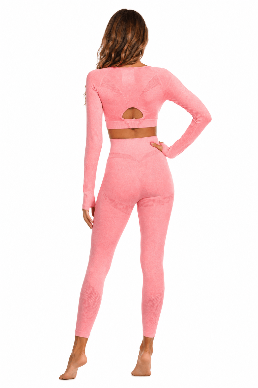 Blush pink seamless long-sleeve crop top with an open back, additional view