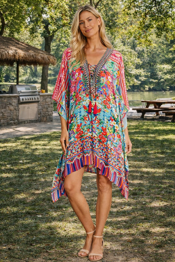 Bold tropical-print kaftan dress with a long, loose silhouette