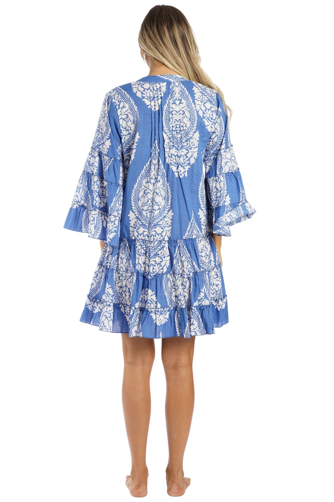 Cobalt Blue block print bell-sleeve tiered babydoll mini dress — back view | Vacation-ready resort dress