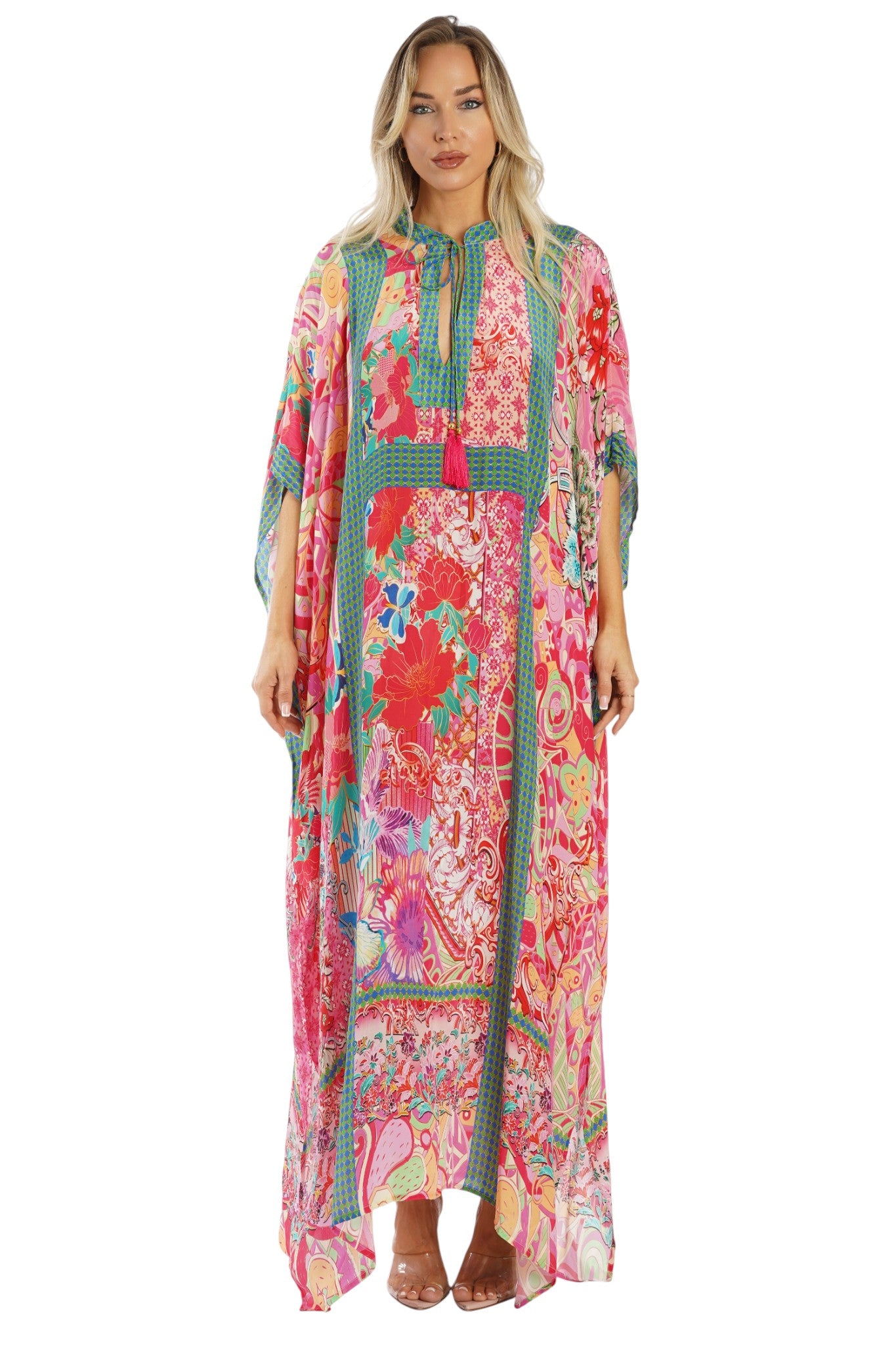 Long pink patchwork-print kaftan as poolside cover-up on a sea day
