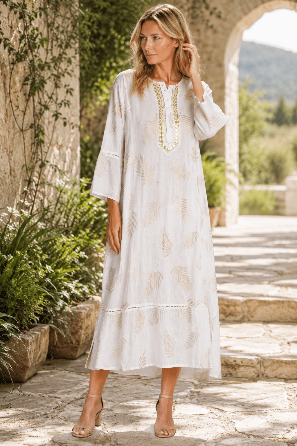 Embroidered white caftan dress, shown from another angle