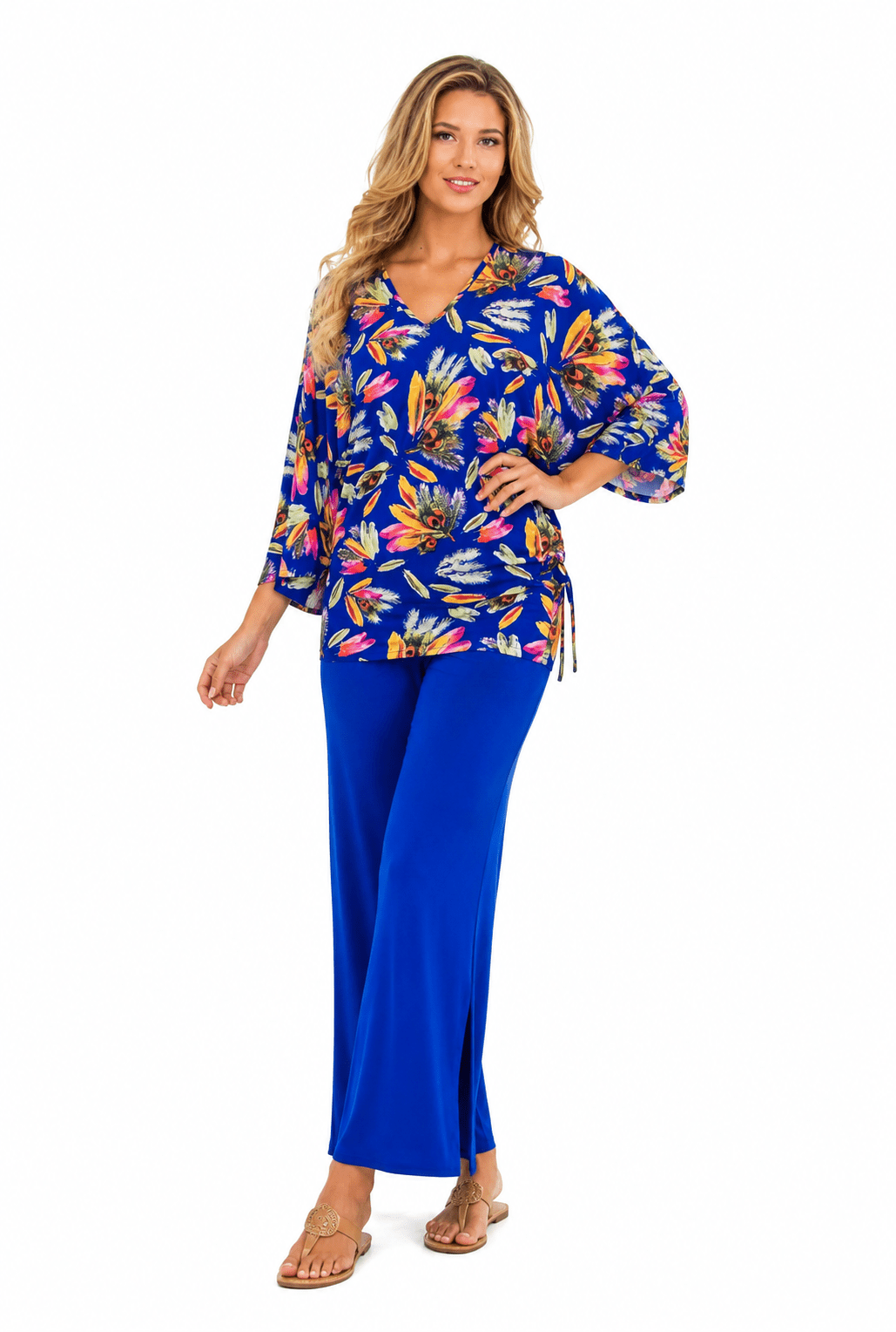 Knit resort tunic top with bell sleeves and a relaxed fit, additional angle