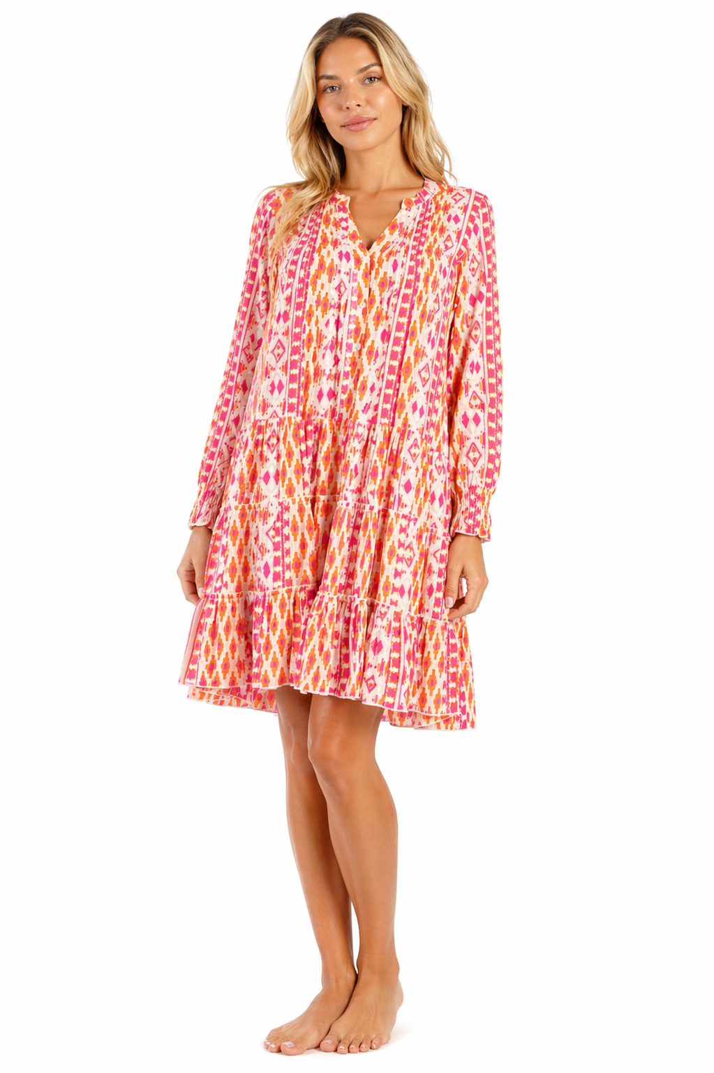 Pink ikat chevron print long-sleeve tiered mini dress — front view | Luxury resort wear from Club Moda