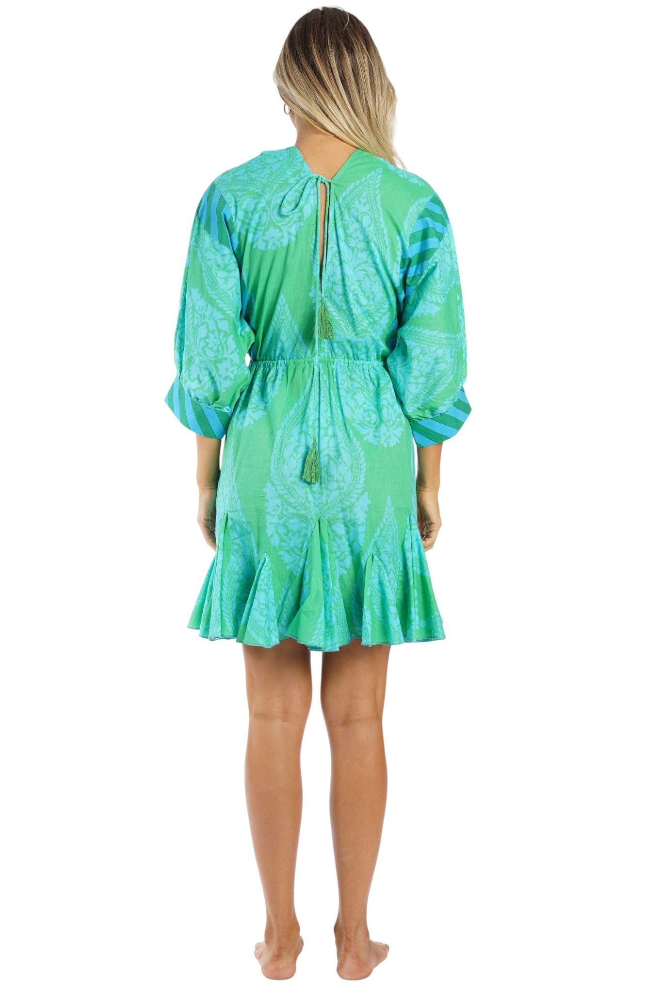 Turquoise tropical tie-dye ombre tiered babydoll mini dress — back view | Vacation-ready resort dress